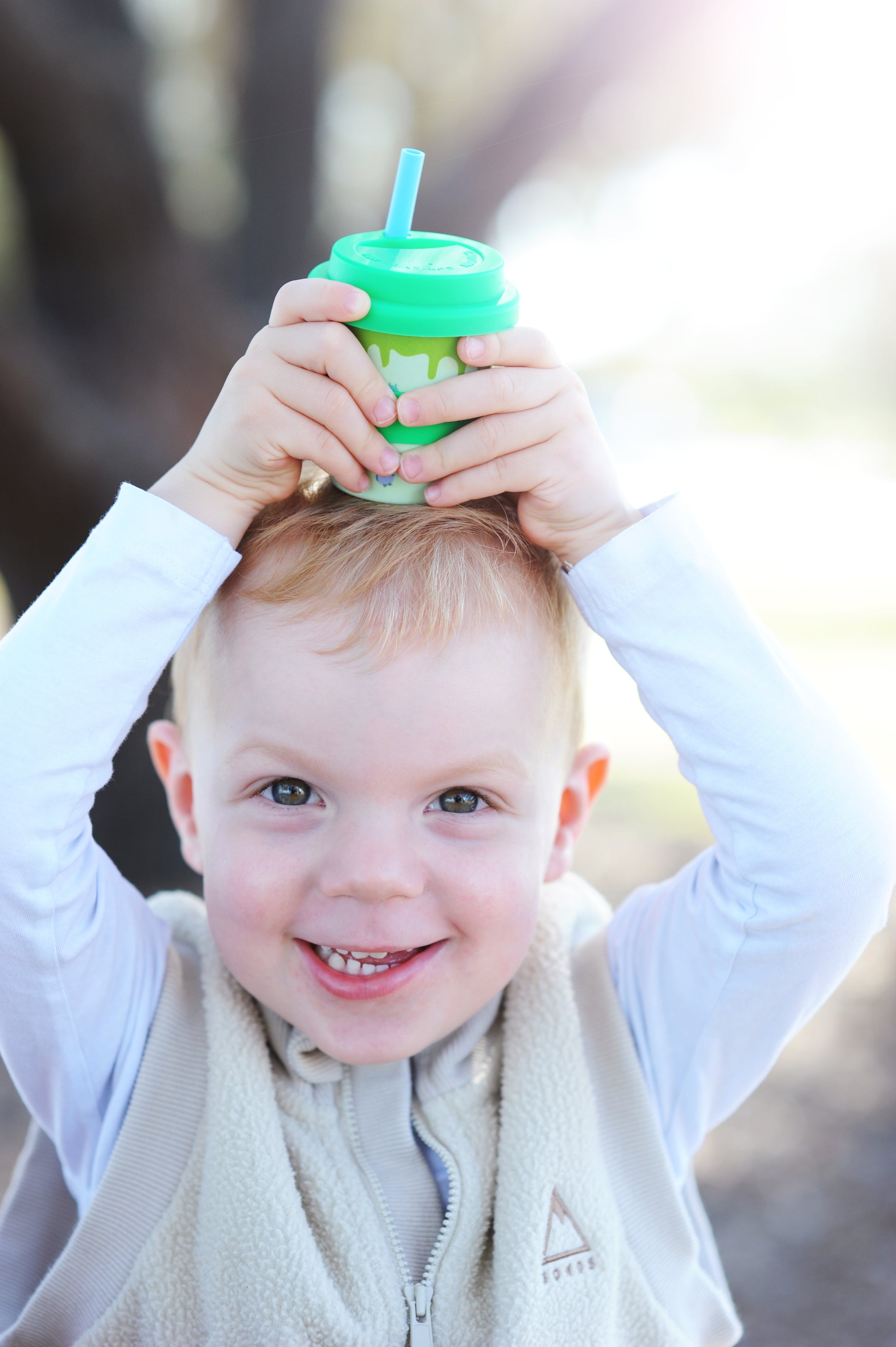 Boy loves his cup